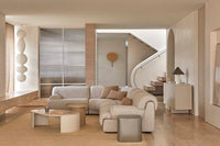 GlobeWest Oberon Curve Marble Coffee Table - Matt Ocean Marble, Natural Ash, styled in a room setting