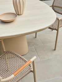 GlobeWest Valencia Weave Dining Armchair - Carbon Grey, styled in a room setting