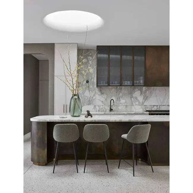 Boden Ridge Vase in marine blue with textured ridged design and glossy finish displayed in modern kitchen setting