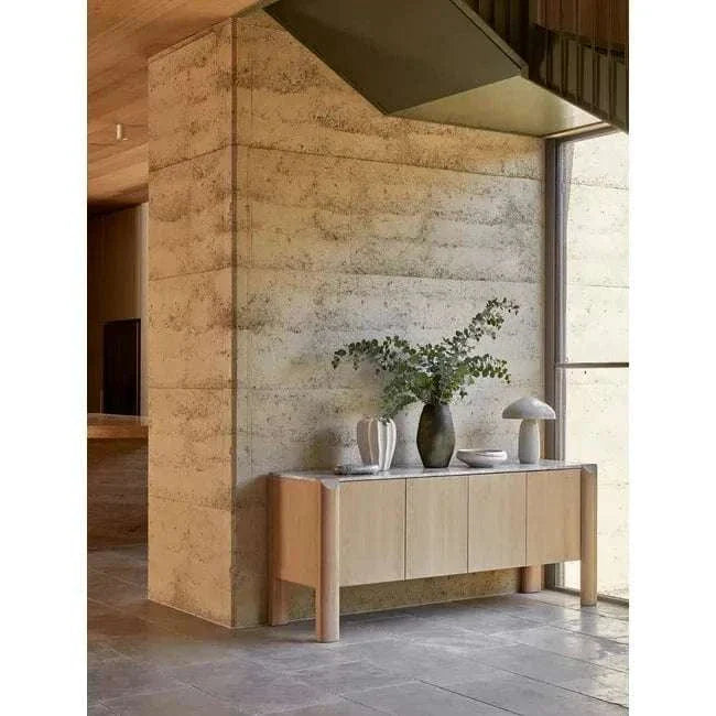 GlobeWest Easton Curve Lamp with oyster grey iron base and curved soft shade on wooden sideboard in modern room