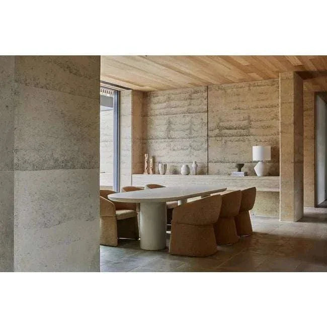 GlobeWest Lorne Roan Table Lamp with white sand ceramic base and ivory cotton linen blend shade in a modern neutral room setting