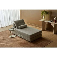 GlobeWest Tepih Neptune Rug in ginger color hand-woven with wool blend in a cozy modern living room setting
