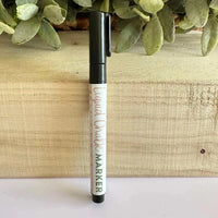 Black liquid chalk marker with fine tip for easy writing on various surfaces and quick water-based cleaning