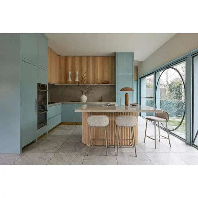 Easton Ellipse Table Lamp with toffee metal powder coated shade and Tuscan marble base in modern kitchen setting