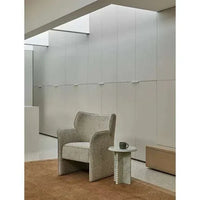 GlobeWest Ruben Occasional Chair in White Bark Sugar Velvet with winged back and contrast piping in modern living room setting