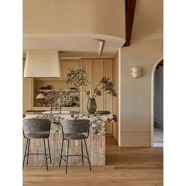 Easton Collins Table Lamp with shell base and ecru linen shade in a modern beige kitchen setting