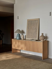 GlobeWest Lorne Pebble Table Lamp - White Sand - Ivory, styled in a room setting