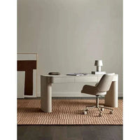 Minimalist Floyd Desk in porcelain finish with three drawers, MDF and ash veneer construction, shown with office chair and lamp on rug in modern workspace