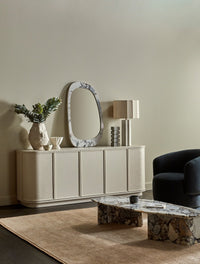 GlobeWest Oakley Pebble Mirror, Ocean Marble - styled over buffet