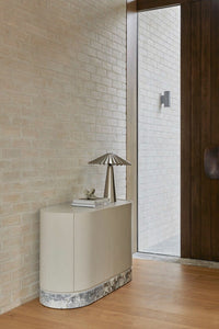GlobeWest Rufus Curve Sculpture - Rainforest Marble, styled in a room setting