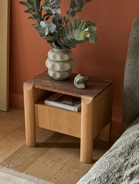 GlobeWest Rufus Curve Sculpture - Rainforest Marble, styled in a room setting