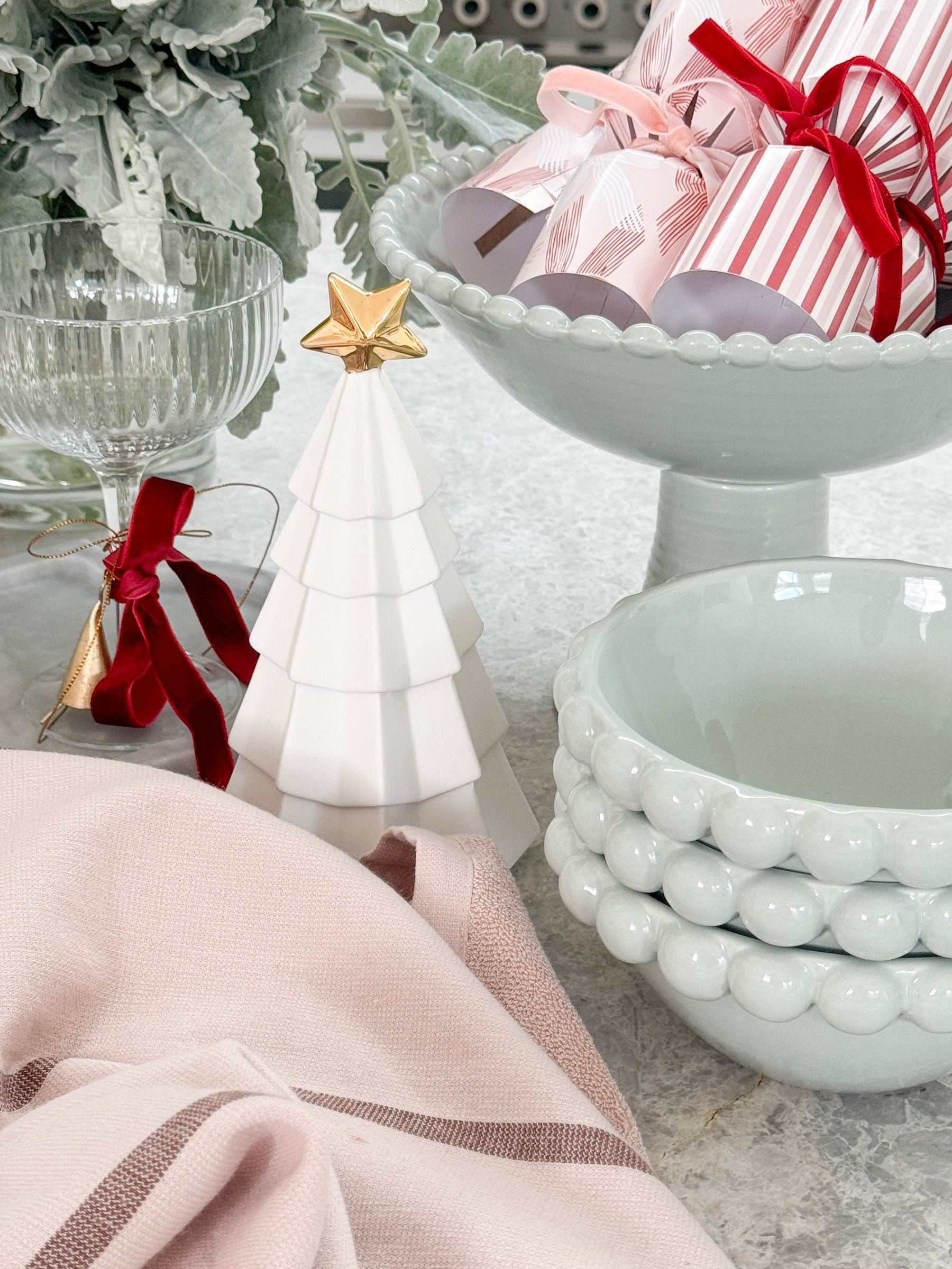 Pale blue Eden Small Bowl ceramic with beaded rim, styled with festive decor and gifts