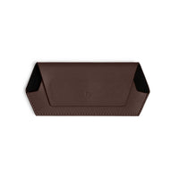 Fox and Leo glasses case in chocolate brown leather with slim, curved design and magnetic closure