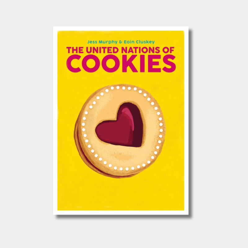 The United Nations of Cookies cookbook by Jess Murphy featuring a heart-shaped jam-filled cookie on a bright yellow cover