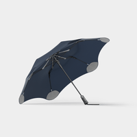 BLUNT Metro Umbrella in midnight navy with compact, durable design and unique 360° spinning canopy technology.