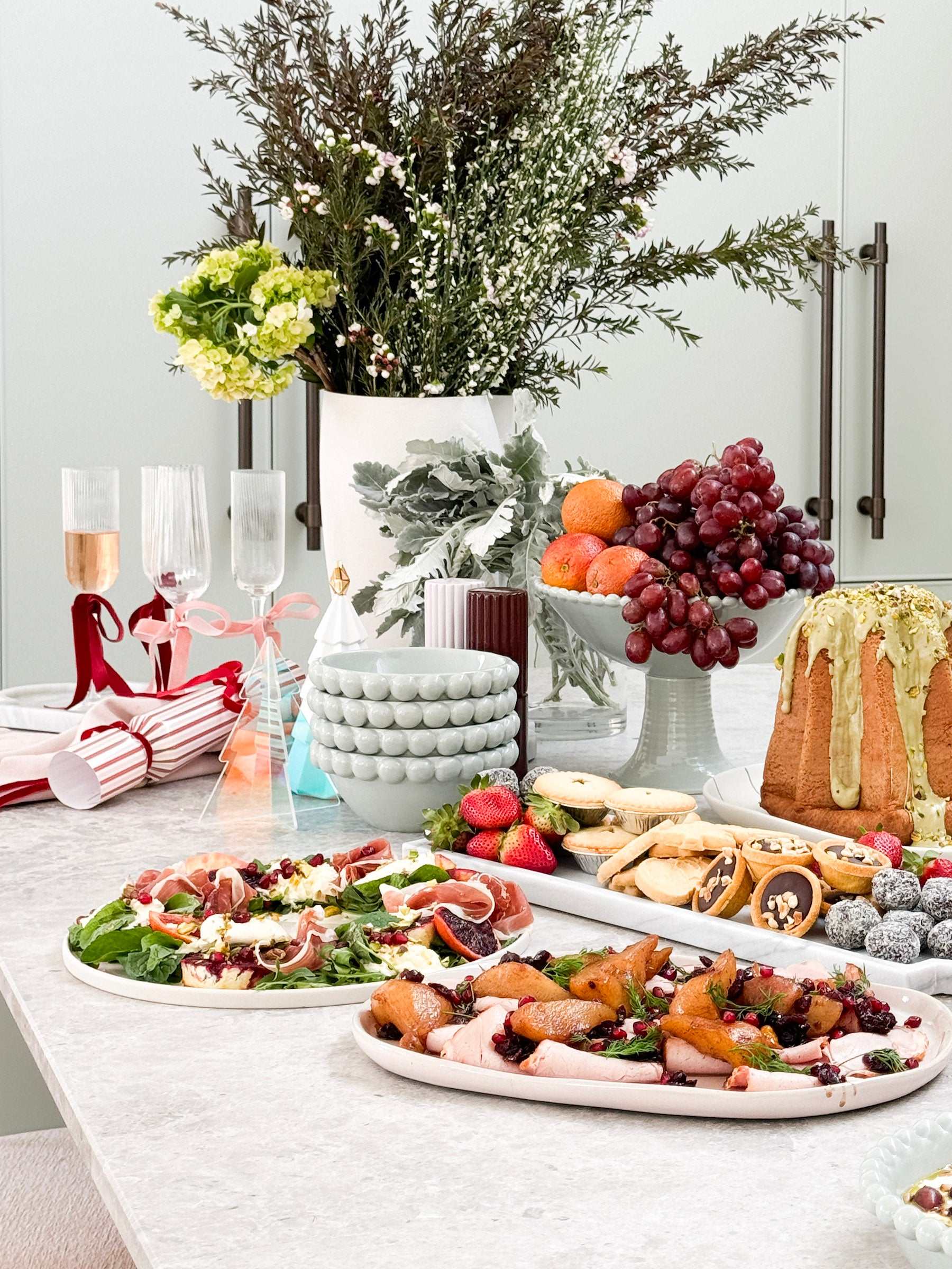 Eden Large Bowl Set pale blue ceramic bowls with beaded rim holding fruit on festive dining table