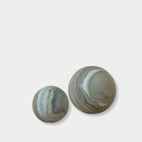 CoTheory Orbit Table Sculpture verde green marble sphere symbolizing harmony and balance