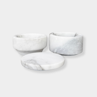 stackable marble jewellery organiser with three cylindrical solid marble pieces showcasing unique veining and modern elegant design