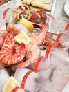 norsu Studio Perspex scalloped ochre drink and food bucket with shrimp and lemon on ice