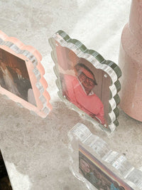 norsu Studio scalloped magnetic photo frame with blush background on marble surface showcasing photos in transparent acrylic with playful edges