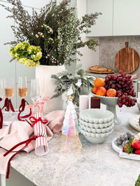 Set of 3 norsu Studio Perspex iridescent standing Christmas trees on marble table with festive decor