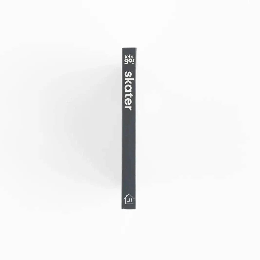 Spine view of Skater Baby board book for toddlers with black cover and white text.