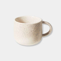 Set of four Robert Gordon My Mugs with celestial glaze and speckled design