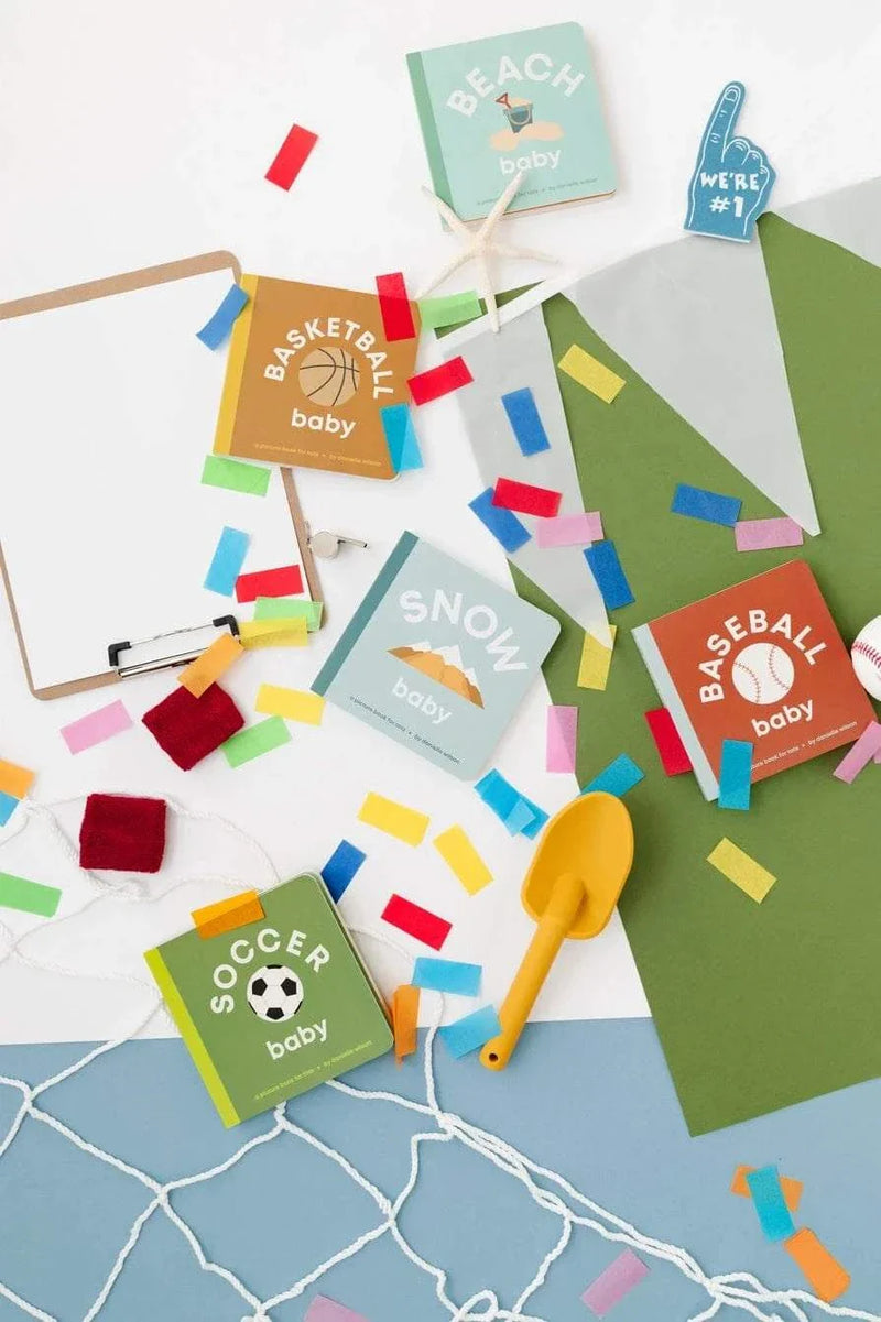 Snow Baby board book for toddlers featuring snow sports with durable triple-layered pages and matte finish