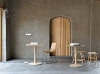 Ethnicraft Oak Torsion Dining Table, styled in a room setting