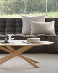 Ethnicraft Oak Mikado Coffee Table - Oval — styled in a room setting