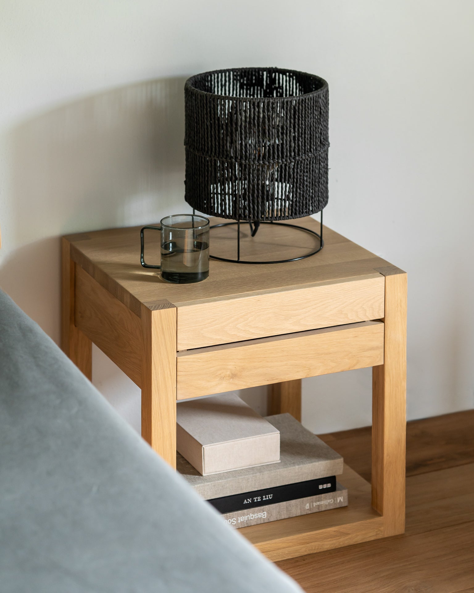 Ethnicraft Azur Bedside Table - 1 Drawer — styled in a room setting
