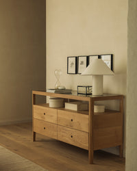 Ethnicraft Oak Spindle Dresser - 4 drawers, styled in a room setting