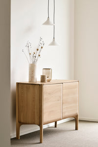 Ethnicraft Oak PI sideboard - 2 Doors, styled in a room setting