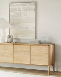 Ethnicraft Oak PI sideboard - 4 Doors, styled in a room setting