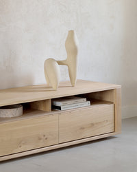 Ethnicraft Shadow TV Stand/Entertainment Unit, styled in a room setting