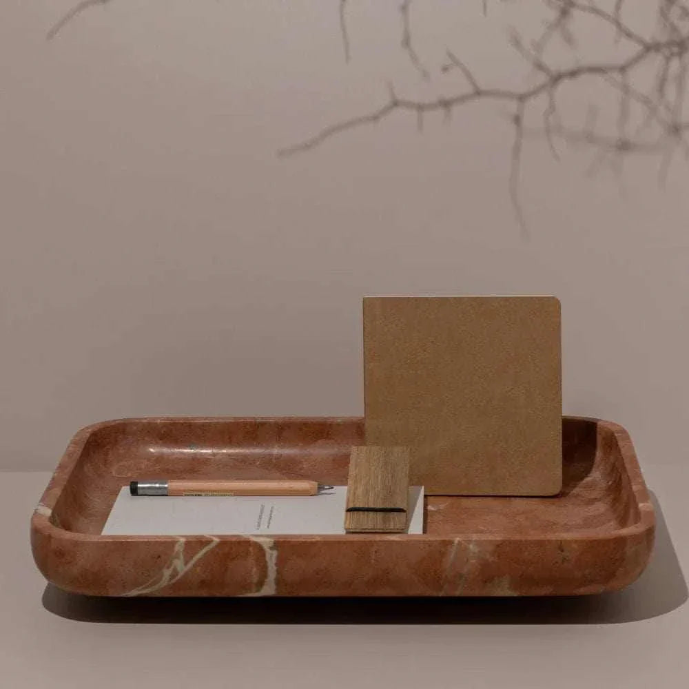 CoTheory marble footed letter tray in Rosso Alicante with natural stone pattern and rounded edges holding stationery items