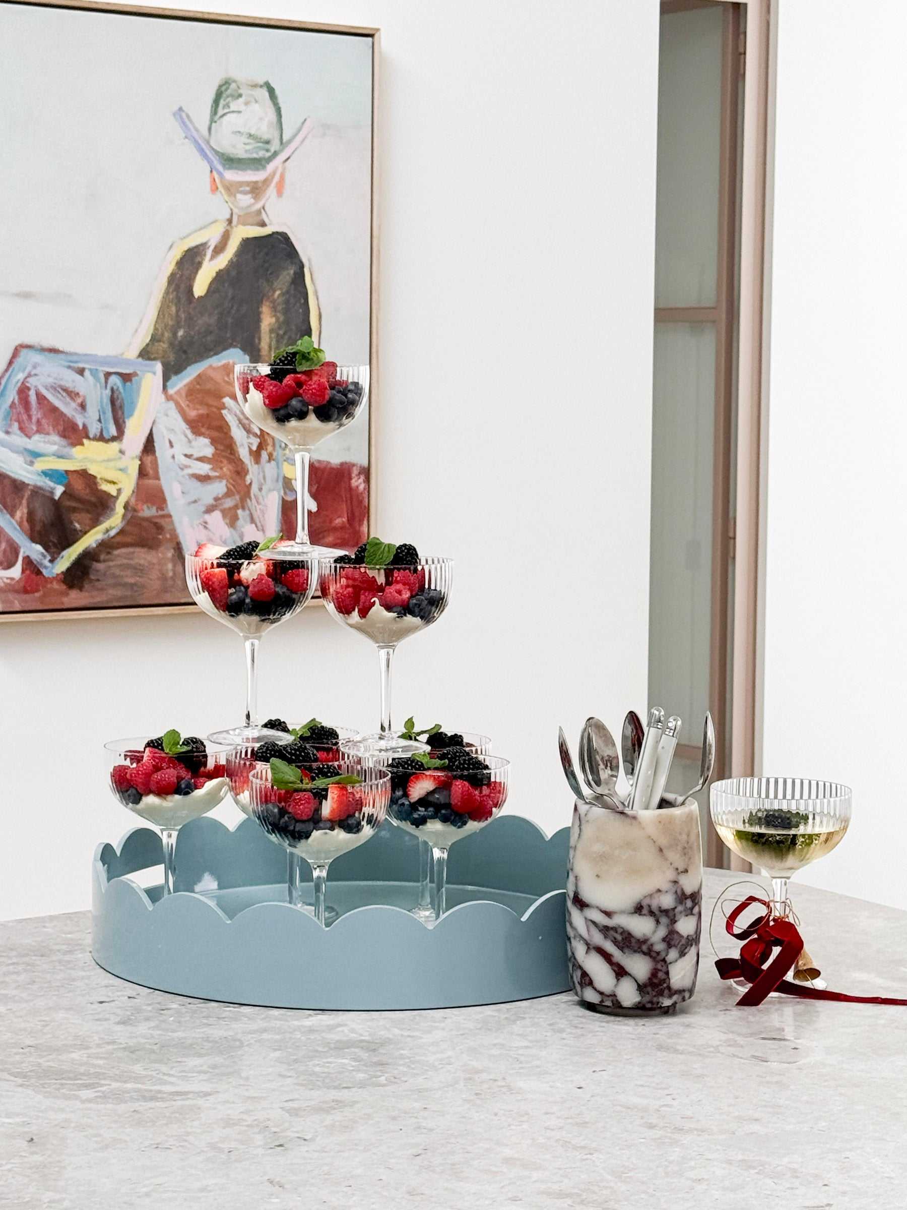 norsu STUDIO Marble Utensil Holder in Viola marble with purple veining, used to hold cutlery on kitchen counter