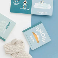Snow Baby board book for toddlers about skiing and snowboarding with durable pages and matte finish