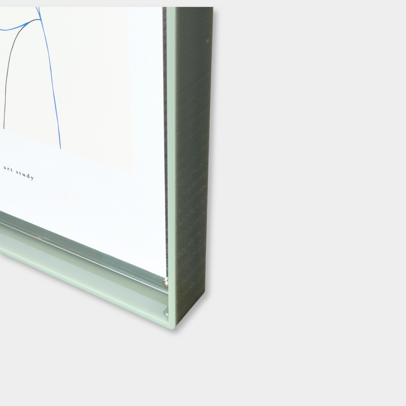 Close-up of norsu STUDIO sage acrylic box gallery frame corner showing sleek premium acrylic construction with sandwich design and screw fasteners for A3 size artwork display.