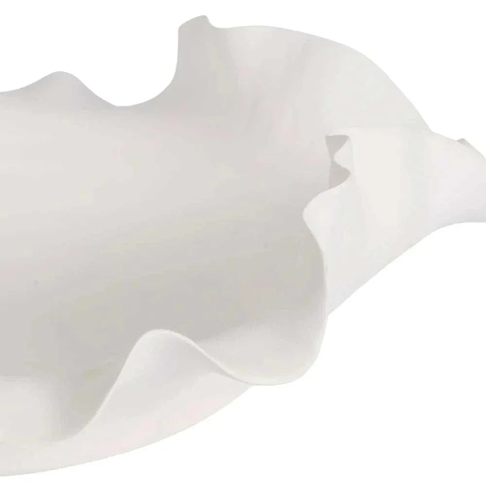 White Nicole Decorative Bowl with ruffled edges and flowing silhouette, handcrafted ceramic centerpiece.