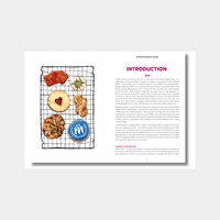 Open book spread showing illustrated cookies on a cooling rack and an introduction text about The United Nations of Cookies by Jess Murphy.