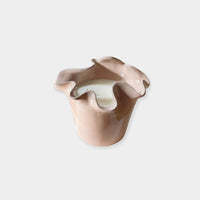 norsu Studio Flow sculptural ceramic scented candle in blush with Alhambra fragrance and ruffled-edge design