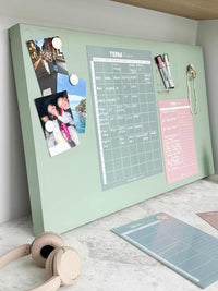 Sky blue magnet meal planner on fridge organizing weekly meals and notes efficiently