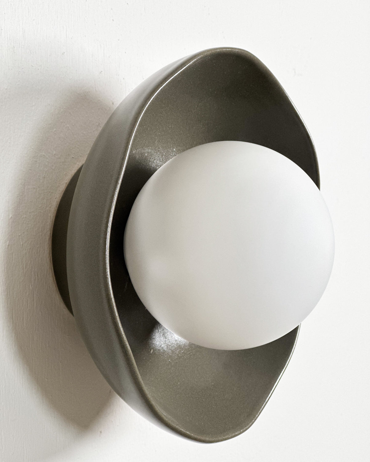 Robert Gordon Shell Wall Sconce ceramic wall light, hand glazed in Olive | norsu Interiors