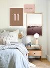 Design Your Own customizable number and color print wall art displayed above a bed in a stylish bedroom setting
