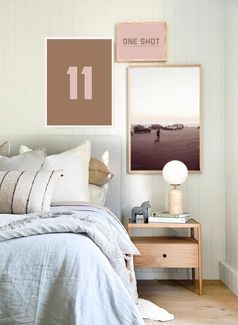 Design Your Own customizable number and color print wall art displayed above a bed in a stylish bedroom setting