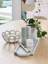 norsu STUDIO Marble Long Tray Calacatta on wooden table with decor and plants