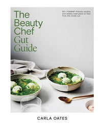 The Beauty Chef Gut Guide book by Carla Oates with gut health recipes and weekly meal plans