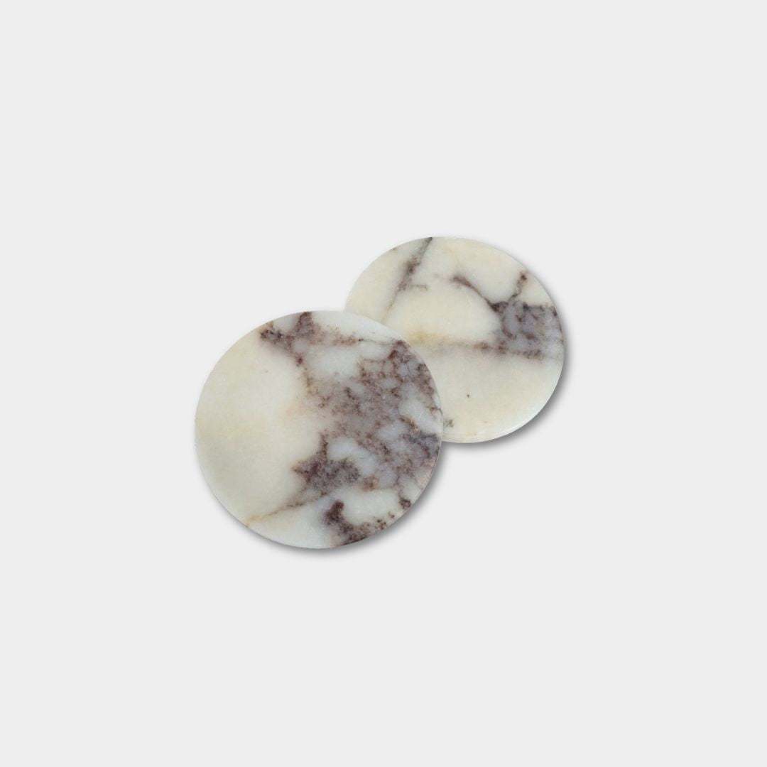 Set of two norsu Studio Viola Marble Coasters with purple veining and polished finish