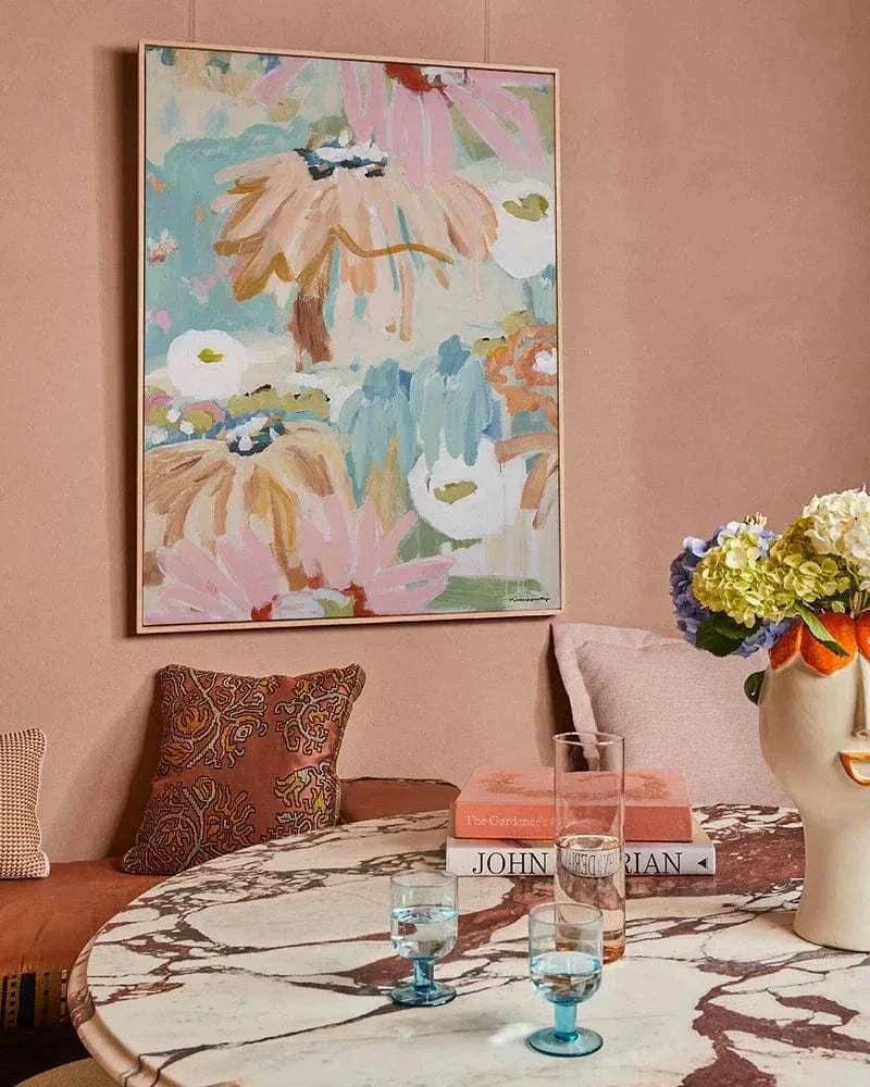Abstract floral Marcia Priestley fine art canvas print in floating oak frame displayed in a stylish living room interior